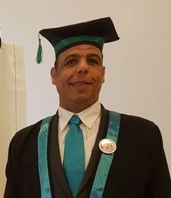 الأستاذ حسن العاصي